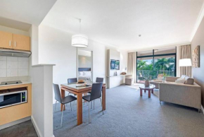 Idyllic Waterfront Pool Escape with Esplanade View